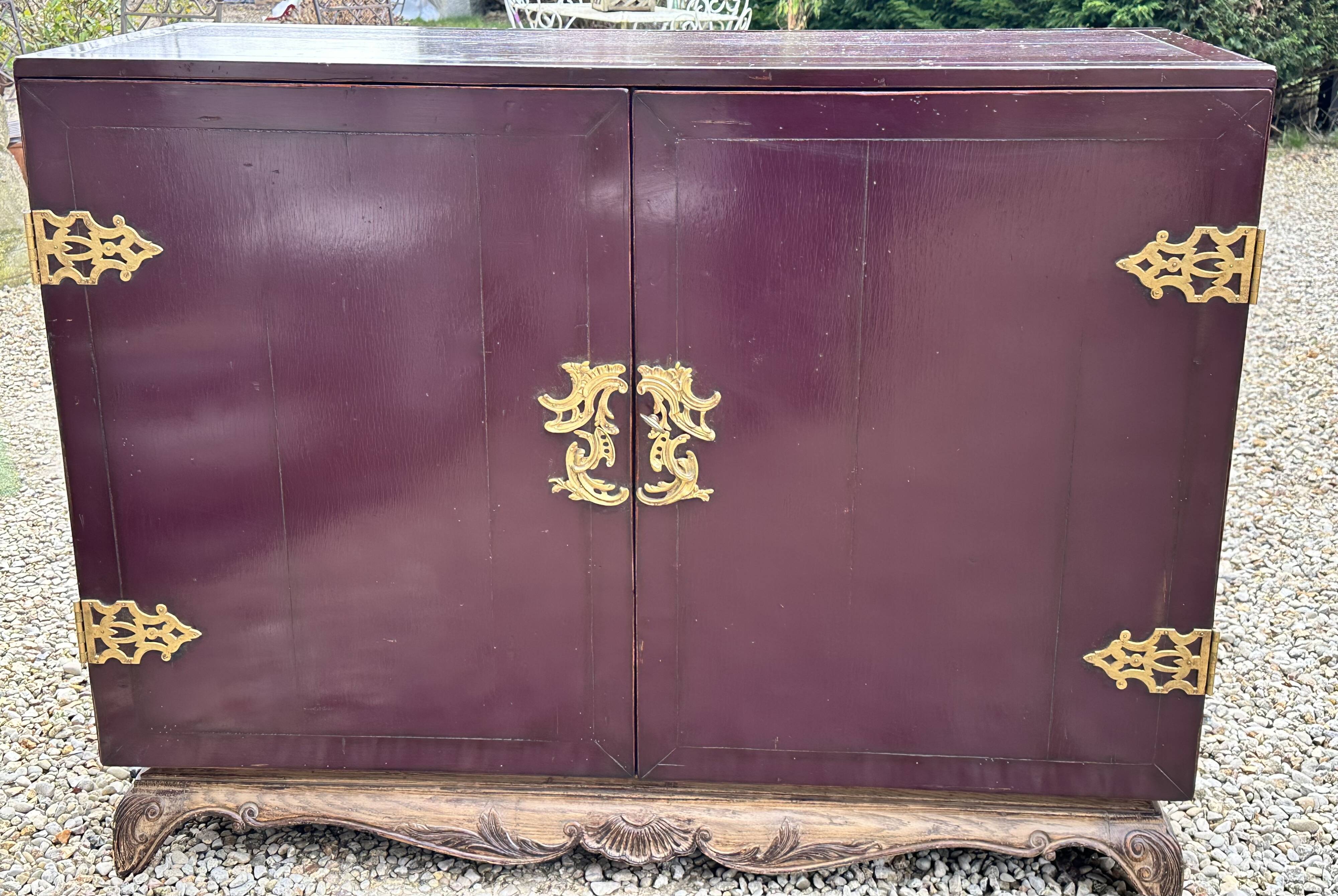 1950's lacquered wood and brass sideboard