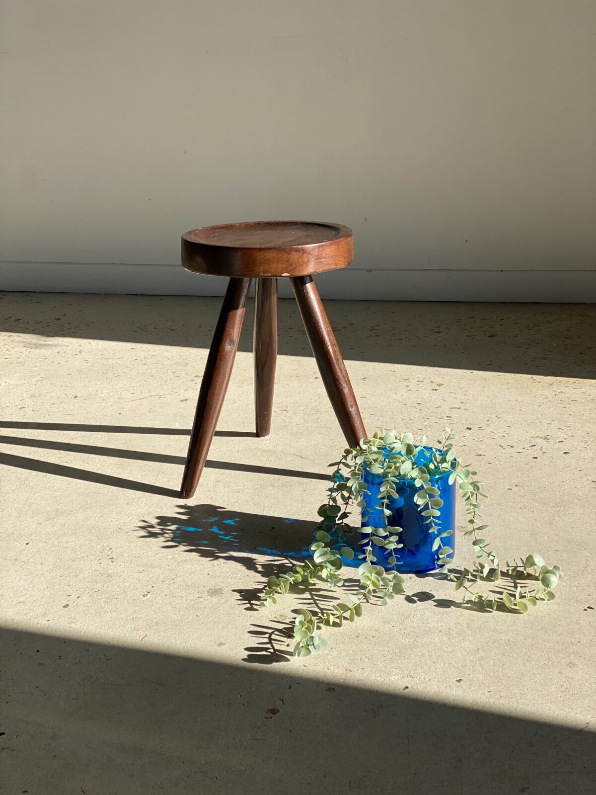 Brown solid wood stool seated circular dug