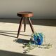 Brown solid wood stool seated circular dug