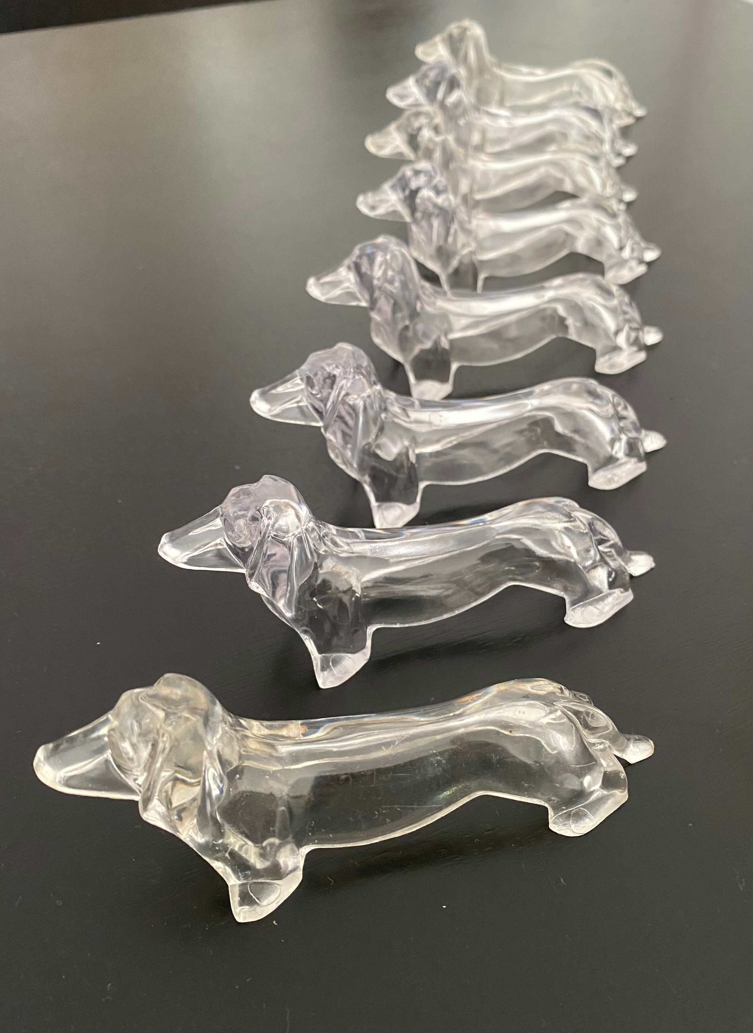 8 plastic knife holders, 70s, dachshund shape