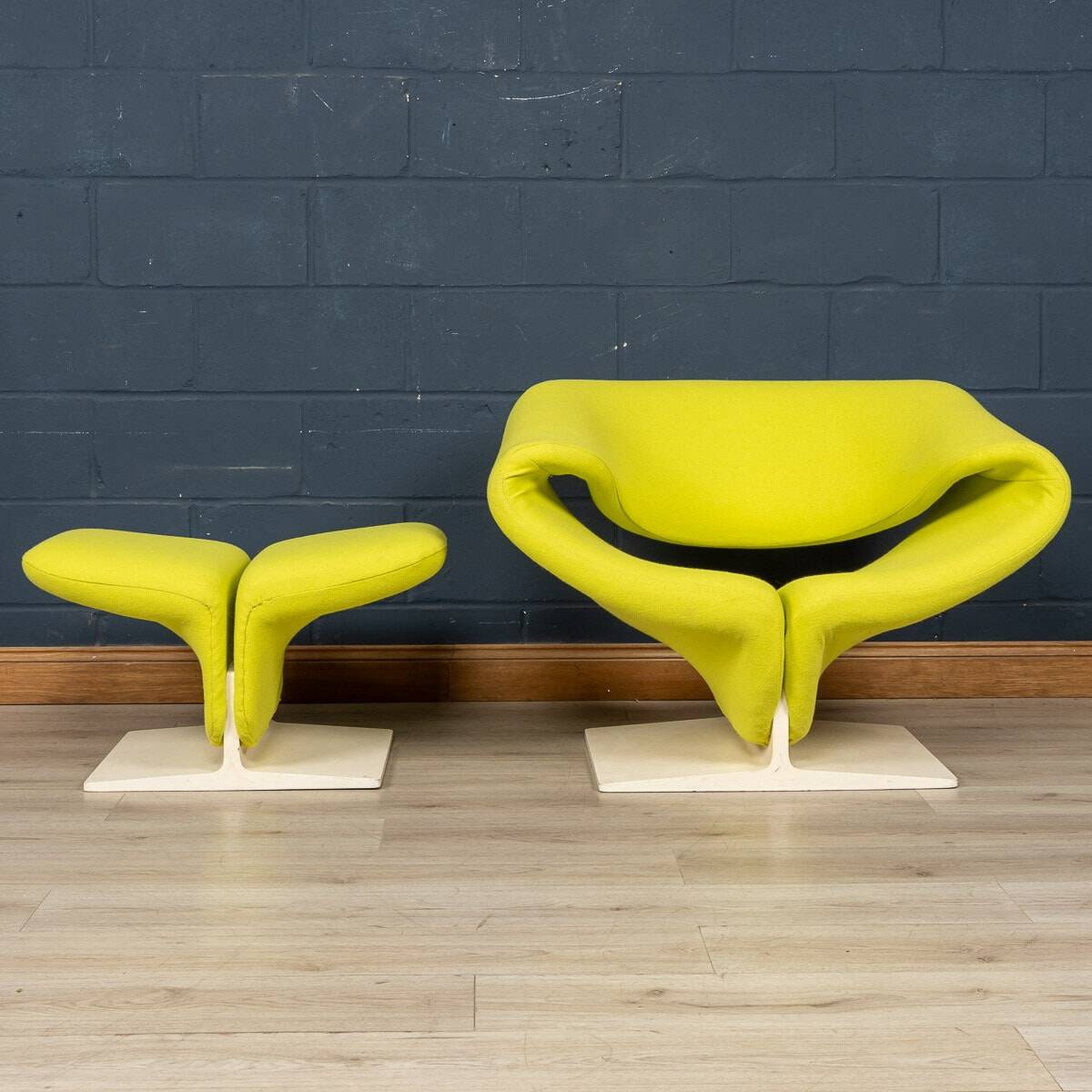 A 20thC RIBBON CHAIR & FOOTSTALL BY PIERRE PAULIN FOR ARTIFORT, FRANCE