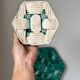 Trio of barbotine art deco coasters and bottle coasters