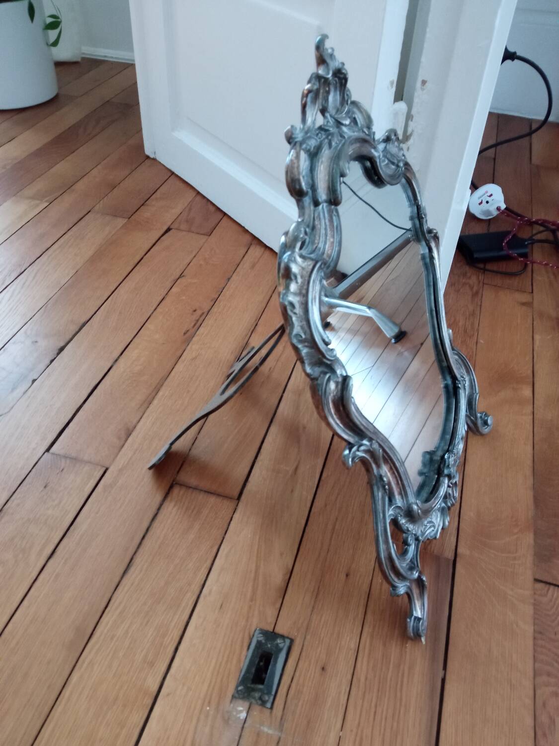 Old standing mirror, silvered bronze