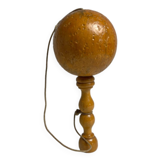 Old bilboquet toy in varnished wood 20th century