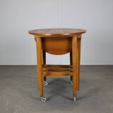Restored Danish folding teak table with three nesting chairs by Poul Hundevad