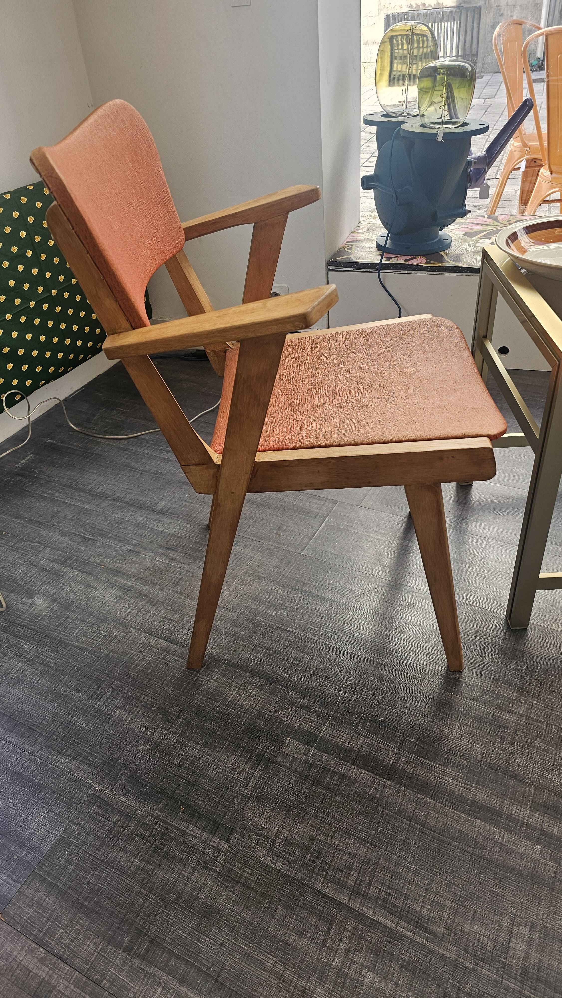 Modernist armchair in wood and orange fabric