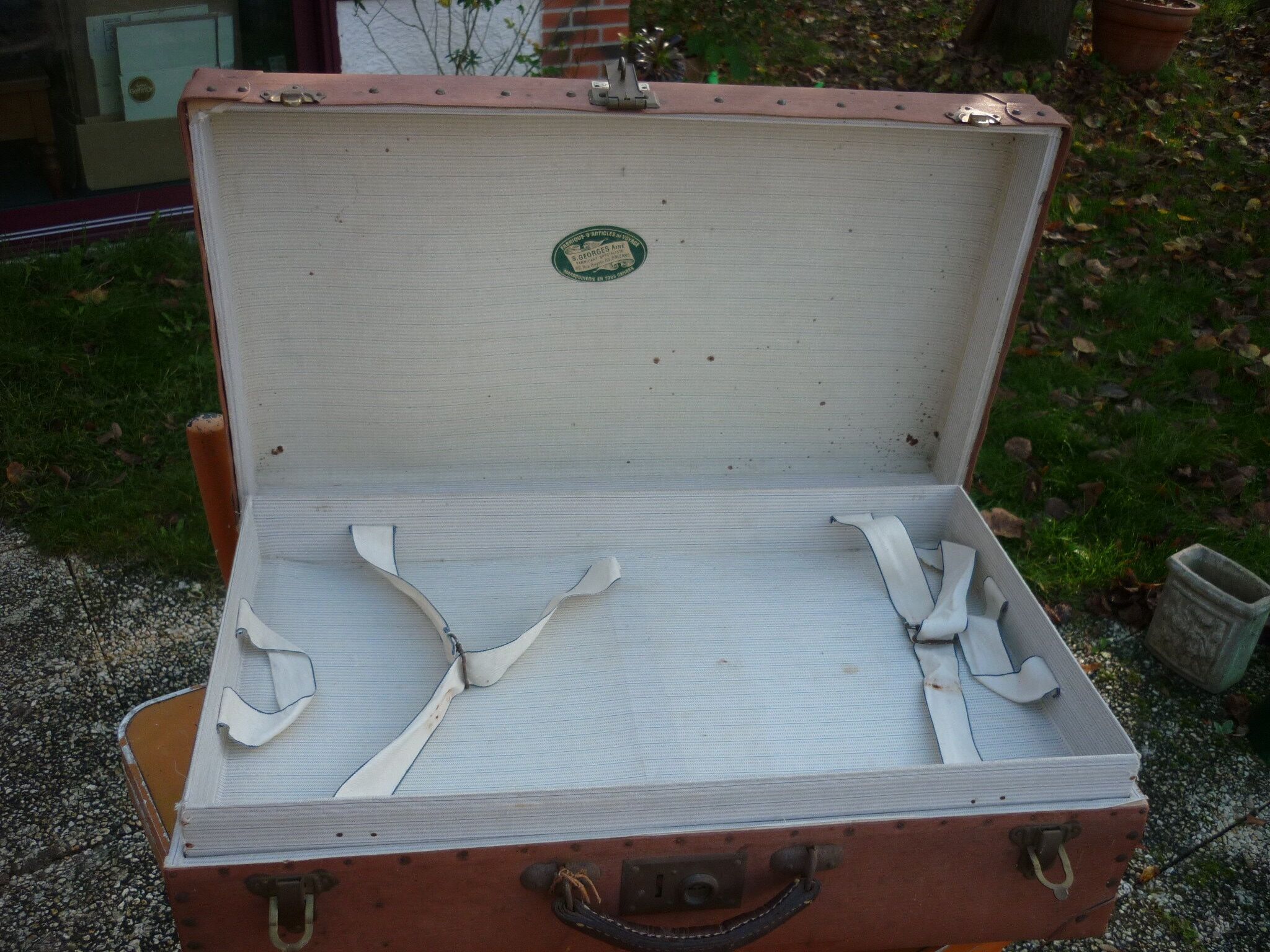 Green cardboard suitcase