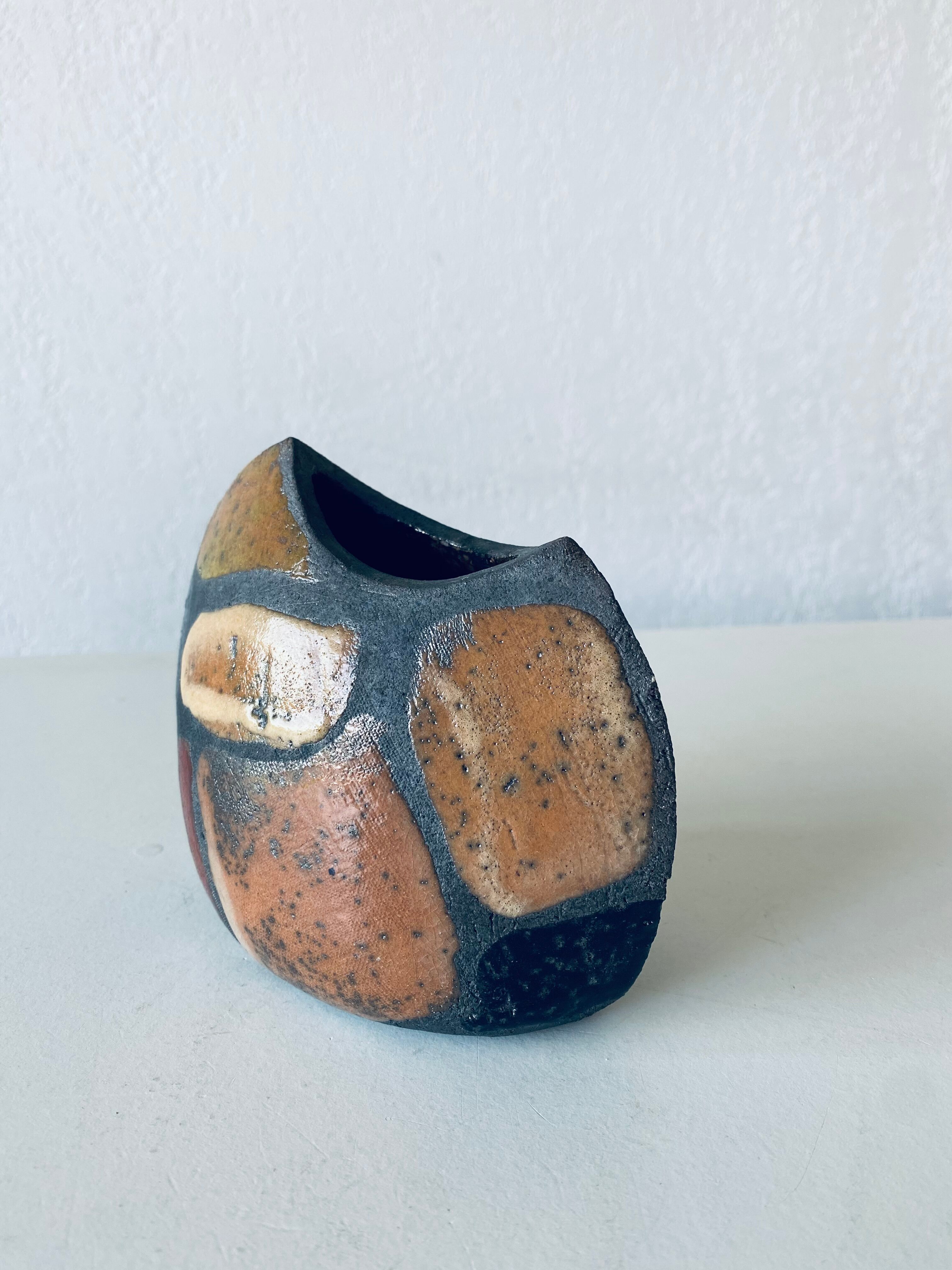 Enamelled ceramic lens vase