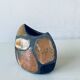 Enamelled ceramic lens vase