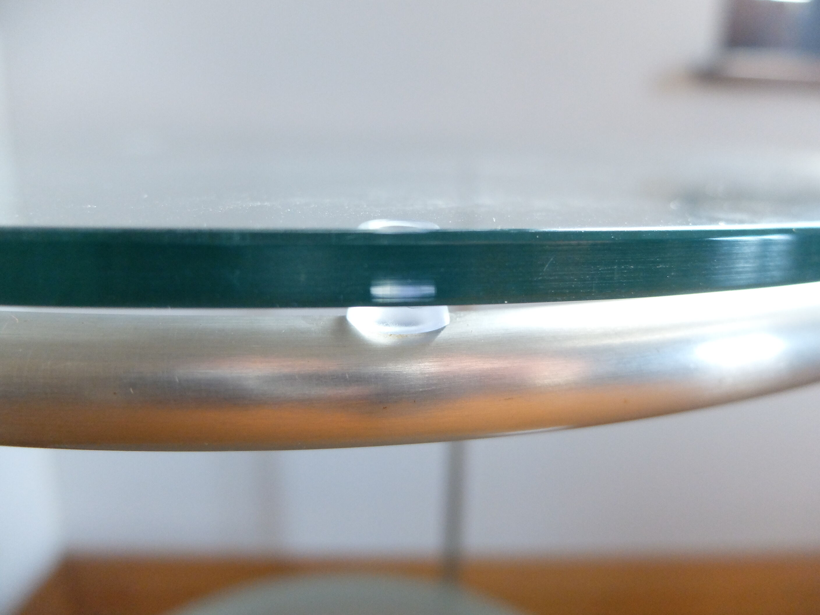 1970s stainless steel pedestal table with two glass tops