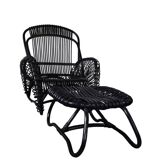 Rattan armchair and matching footstool