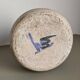 Mid-century modern stoneware vase with cobalt blue dots.