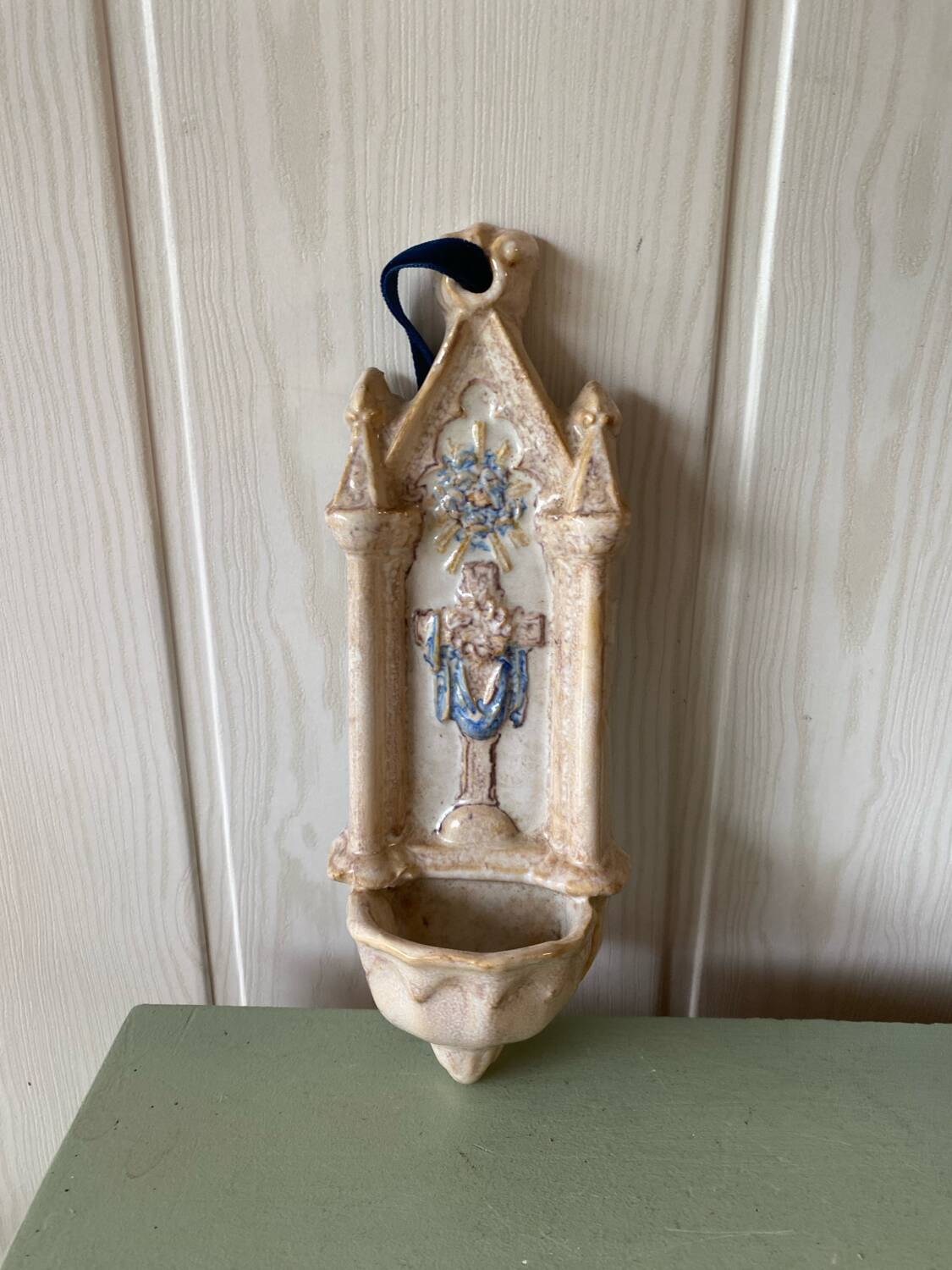 Antique holy water font in polychrome enamelled earthenware signed