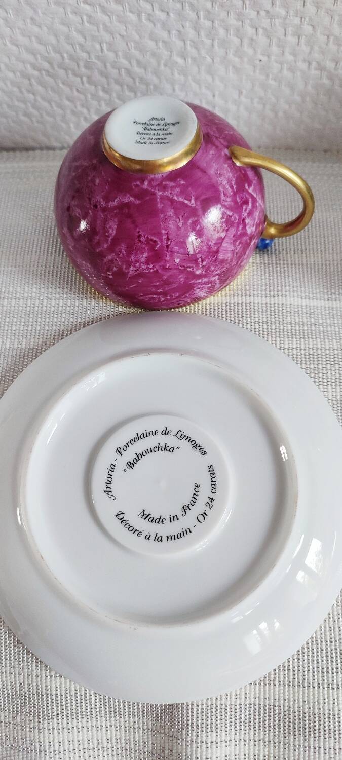 Two Artoria Babouchka Limoges porcelain cups and saucers