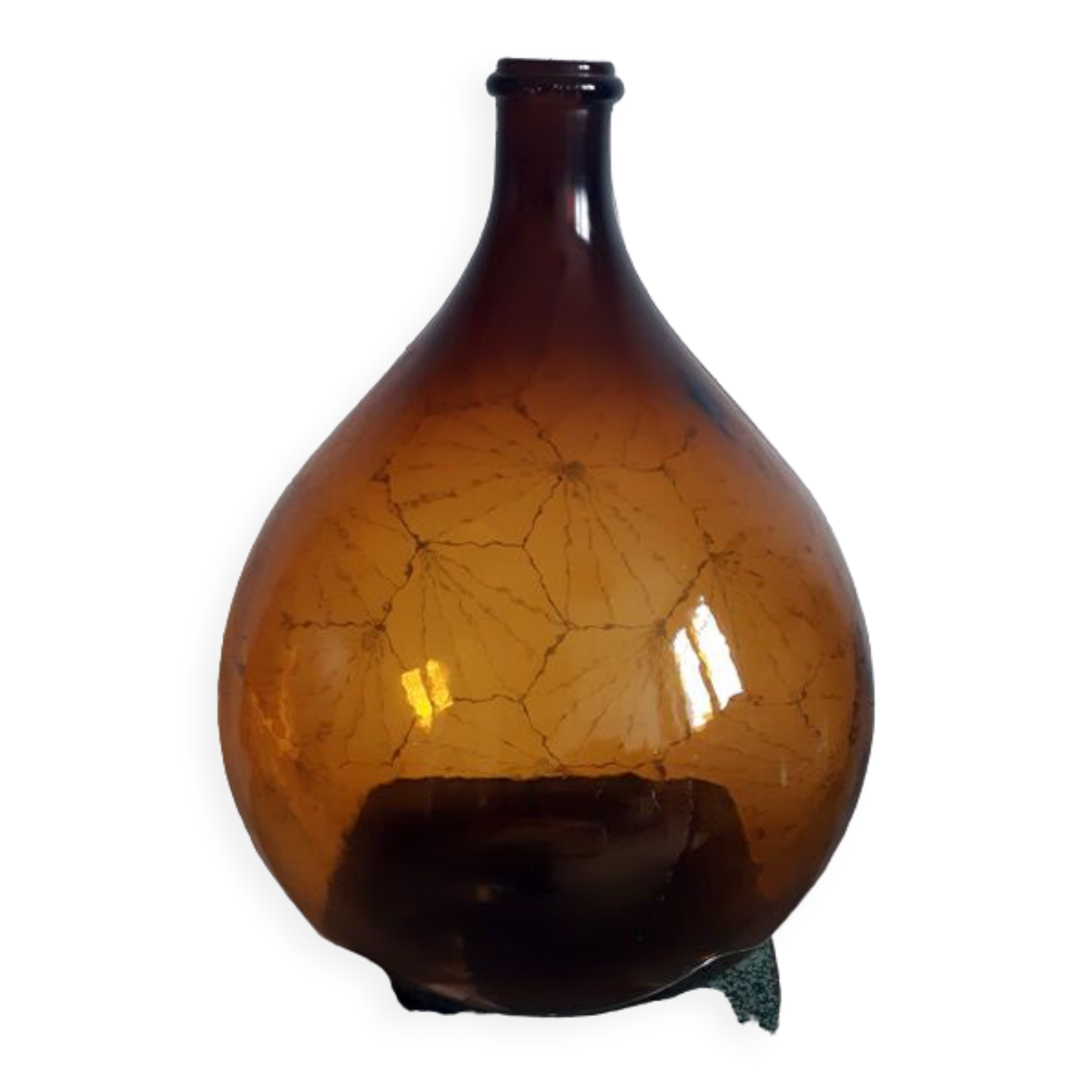 Great old demijohn in amber glass