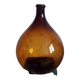 Great old demijohn in amber glass