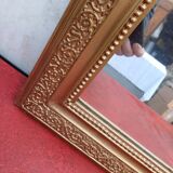 19th century wood and gilded stucco mirror