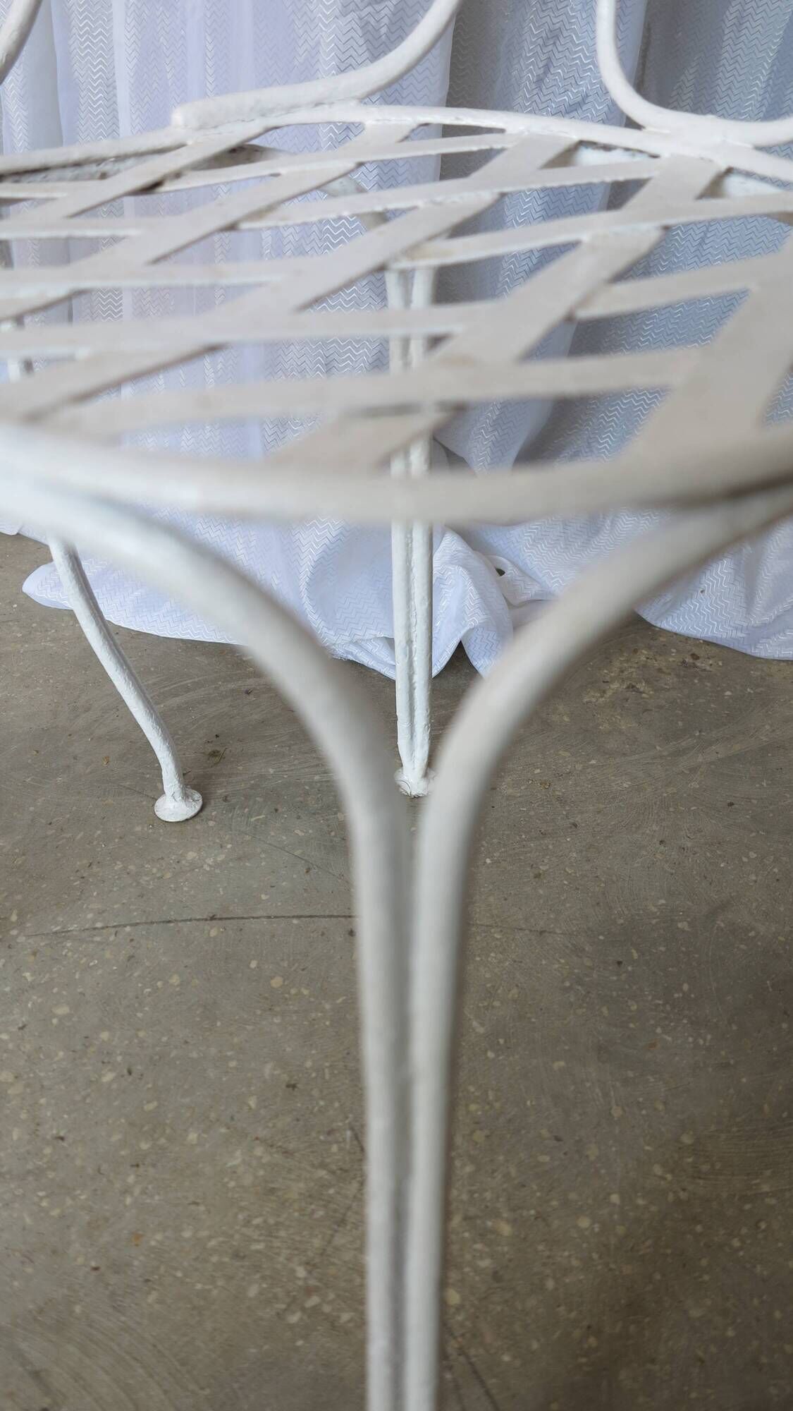 Pair of antique garden chairs, wrought iron, white paint.