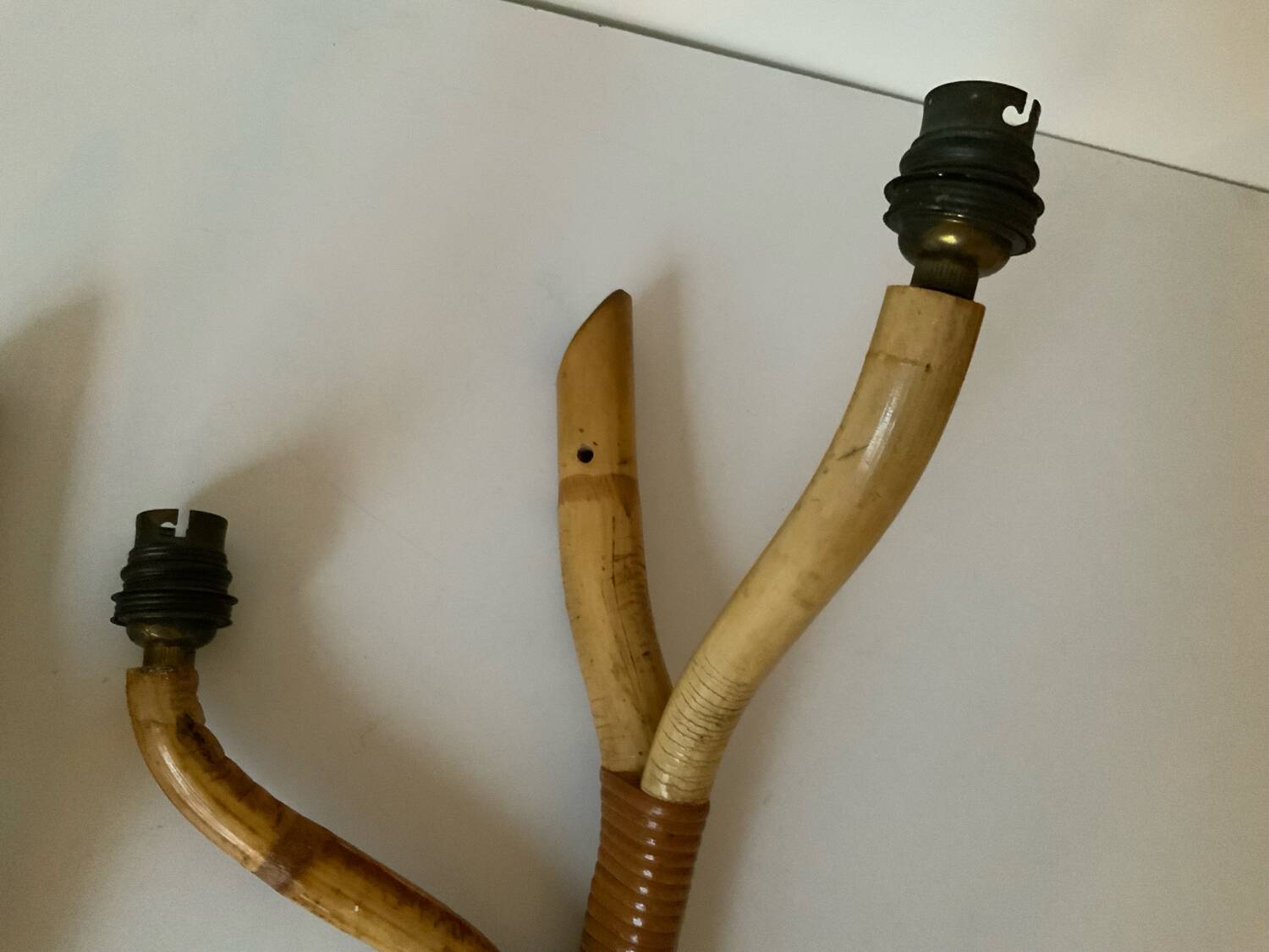 Rattan wall light trio