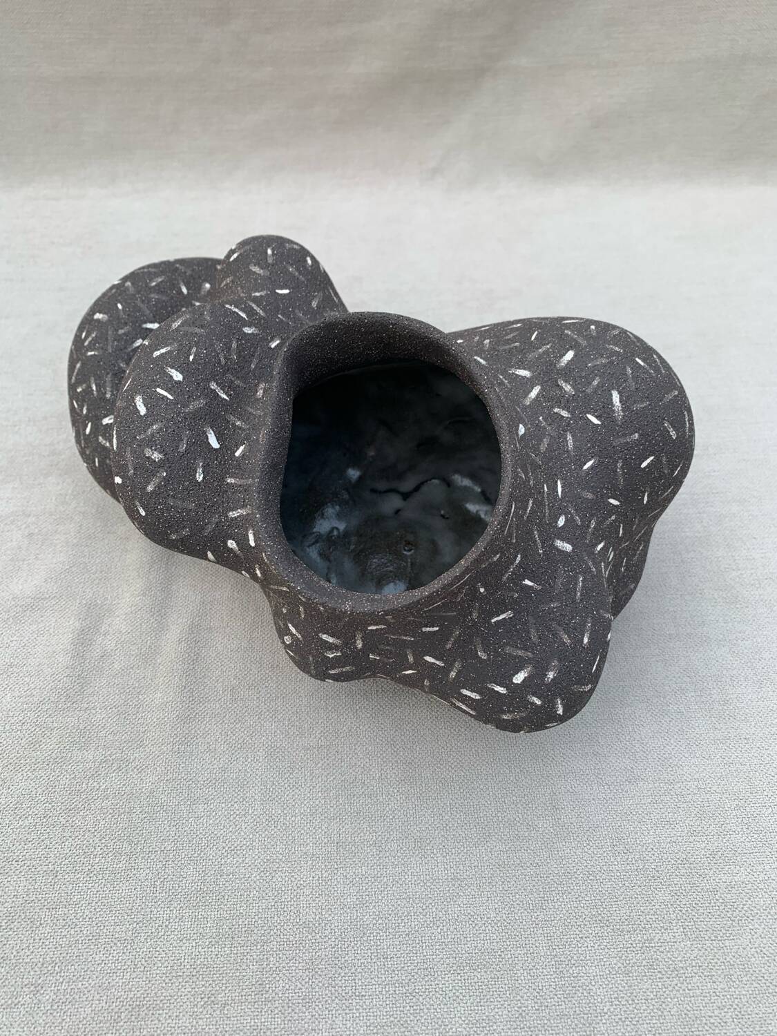 Raw black stoneware vase