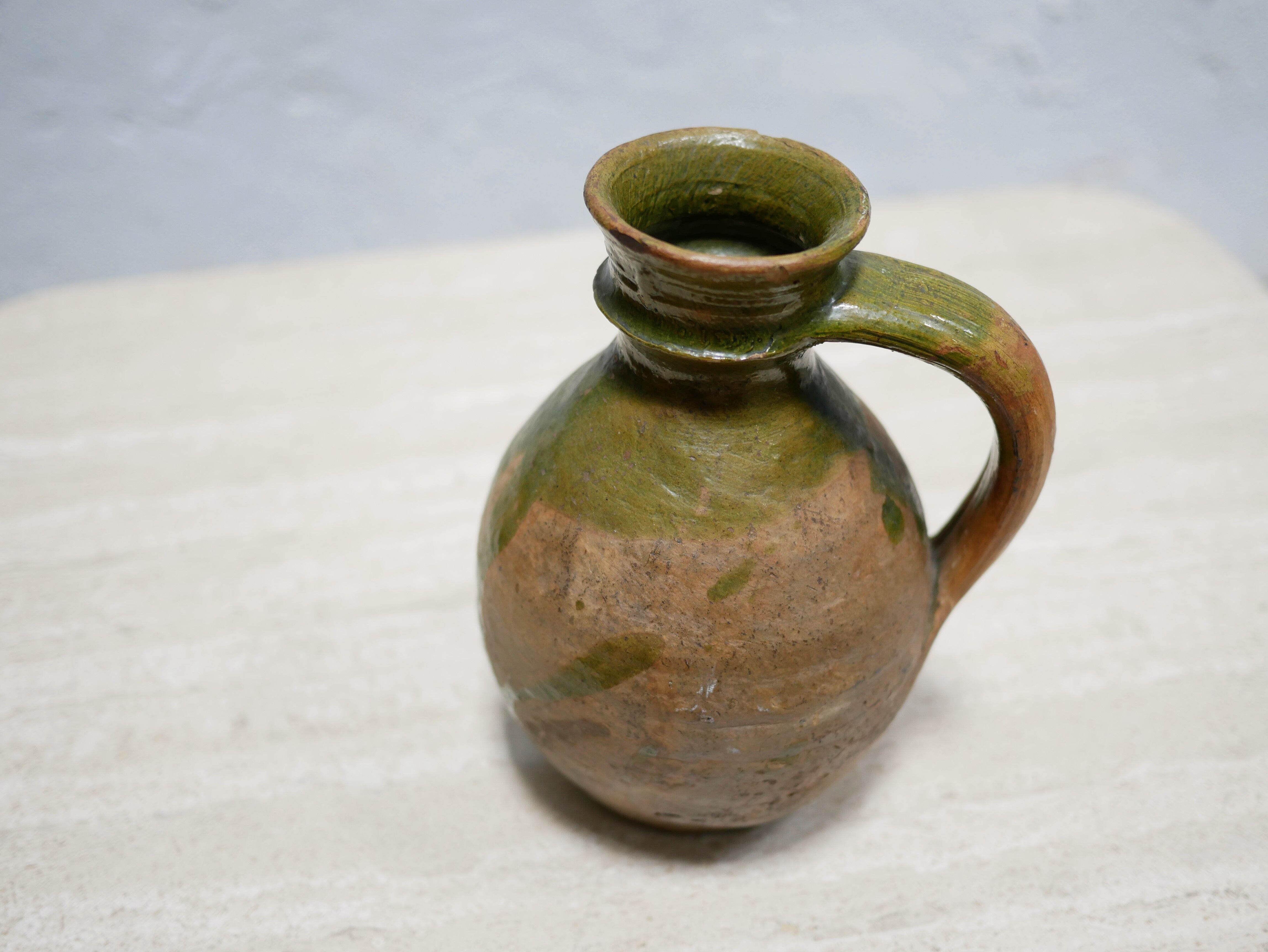 Old glazed terracotta jar