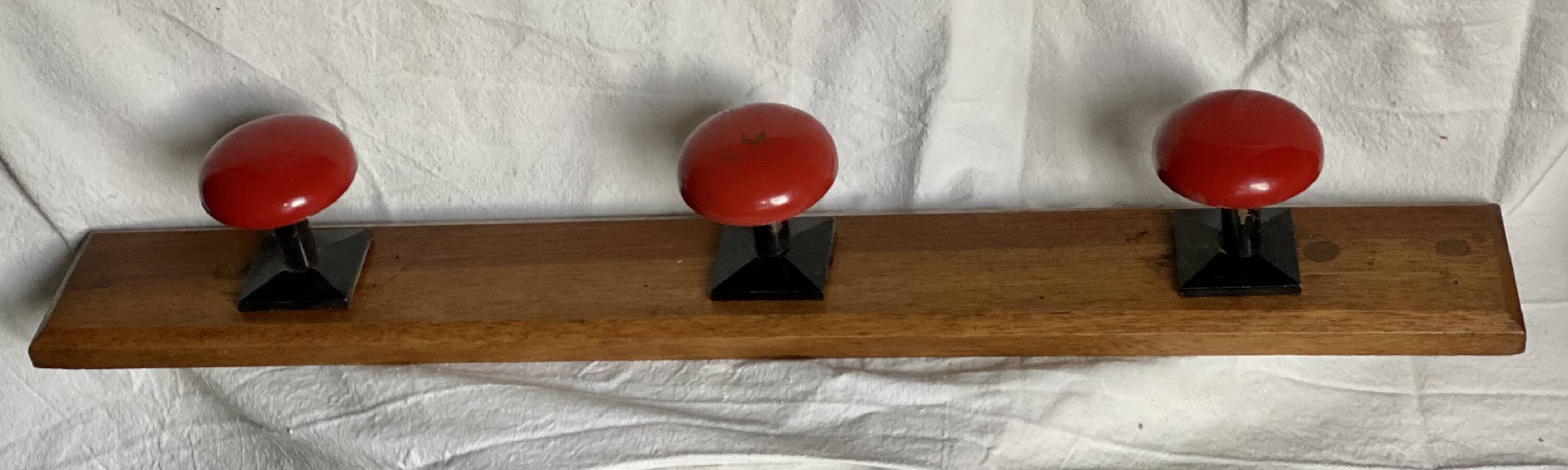 Wall-mounted coat rack with 3 hooks, vintage 1960s red lacquered metal.