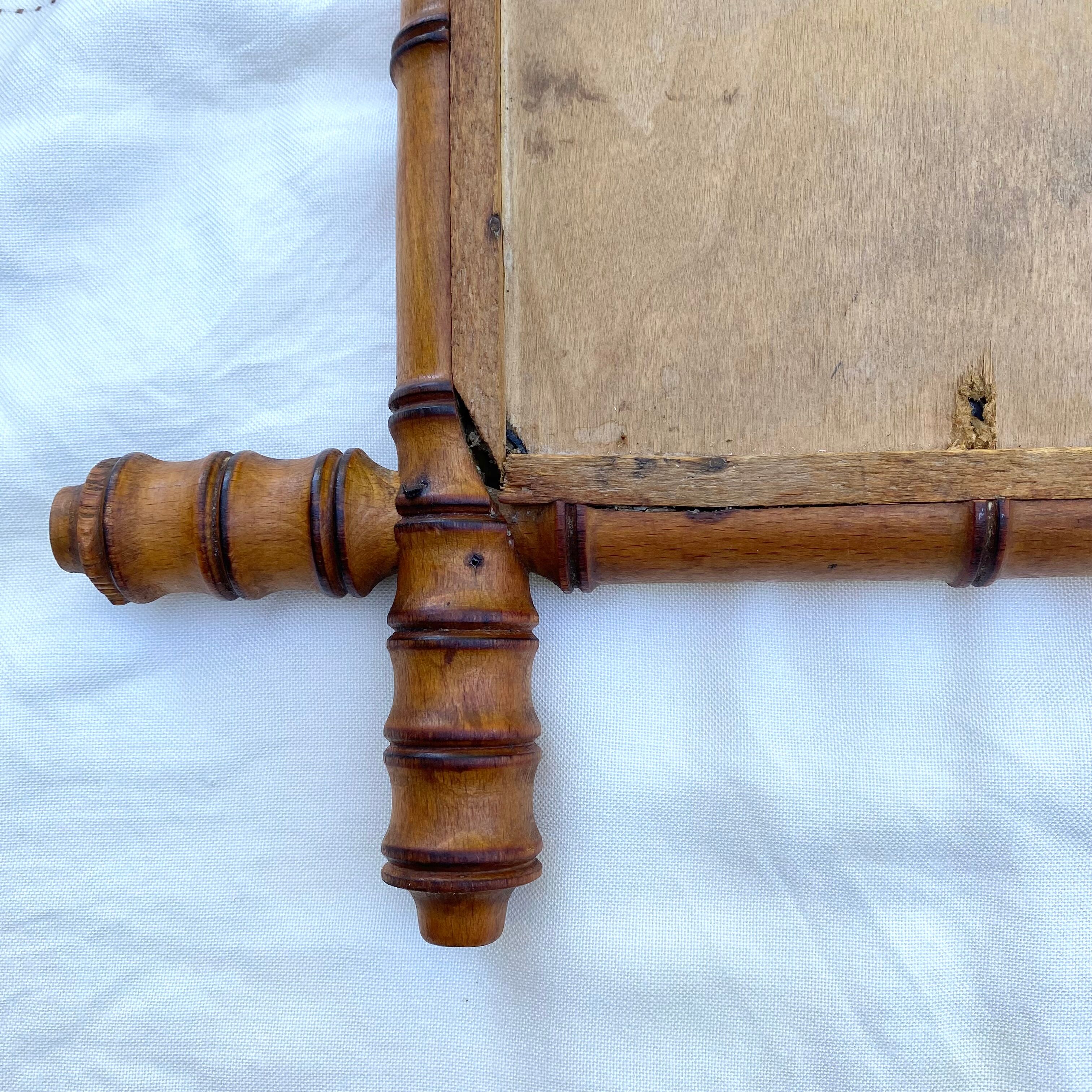 Antique mercury mirror in bamboo-style wood