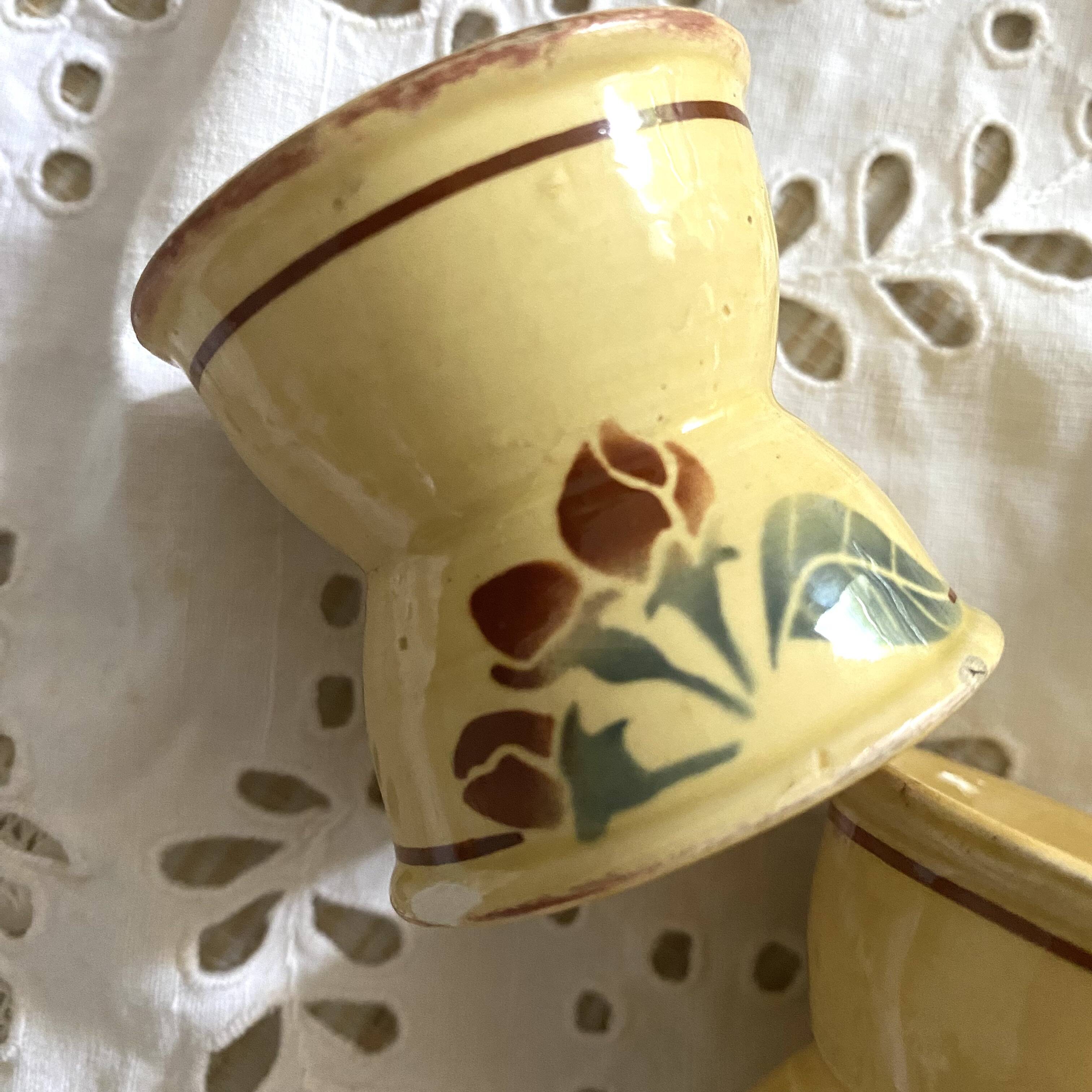 Antique diabolo egg cups