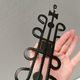 Vintage wall candle holder, wrought iron and  pressed orange/amber glass