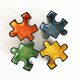 Ensemble de vide poches puzzle en céramique. Italie, années 80