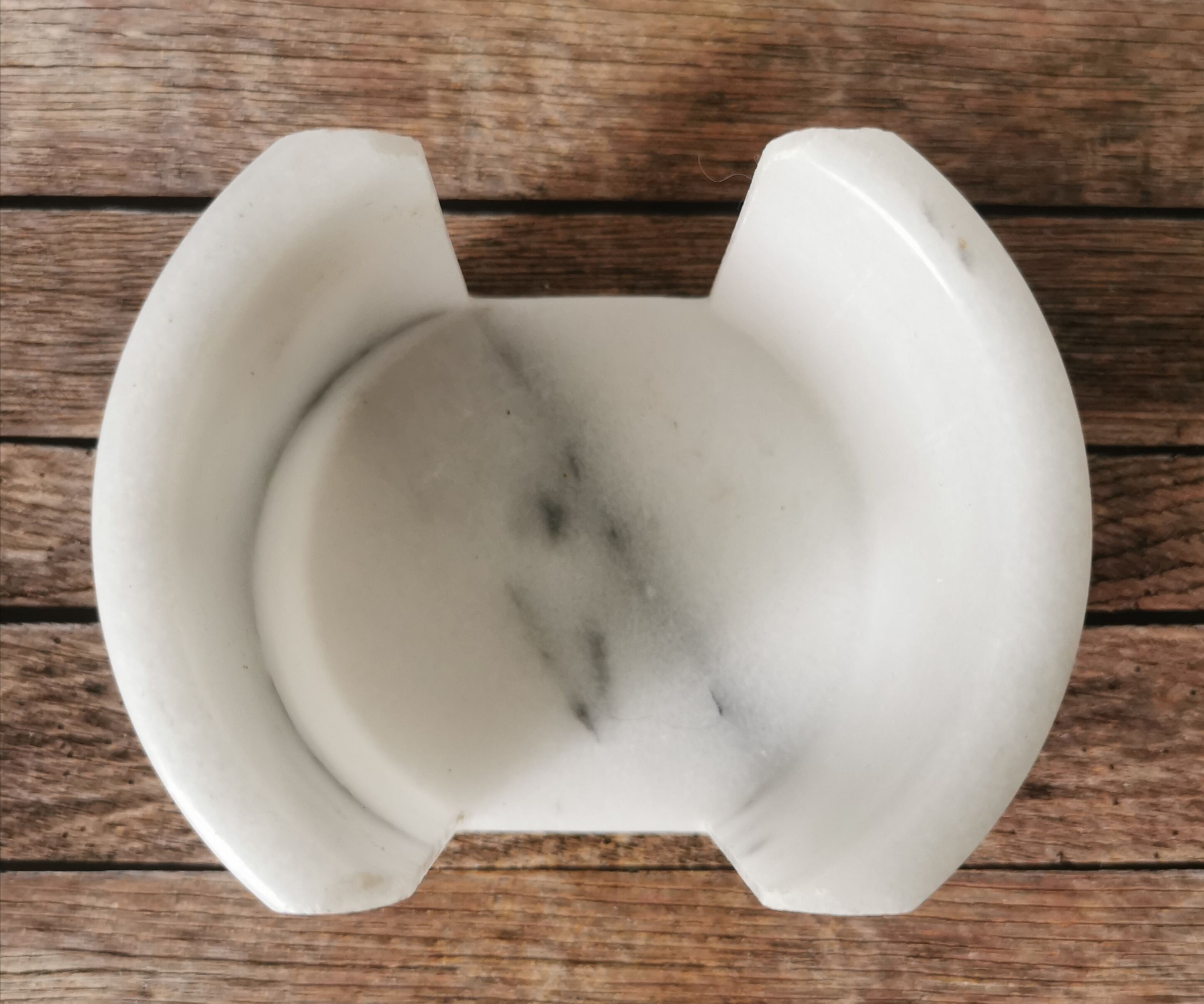 Ashtray and marble under glass