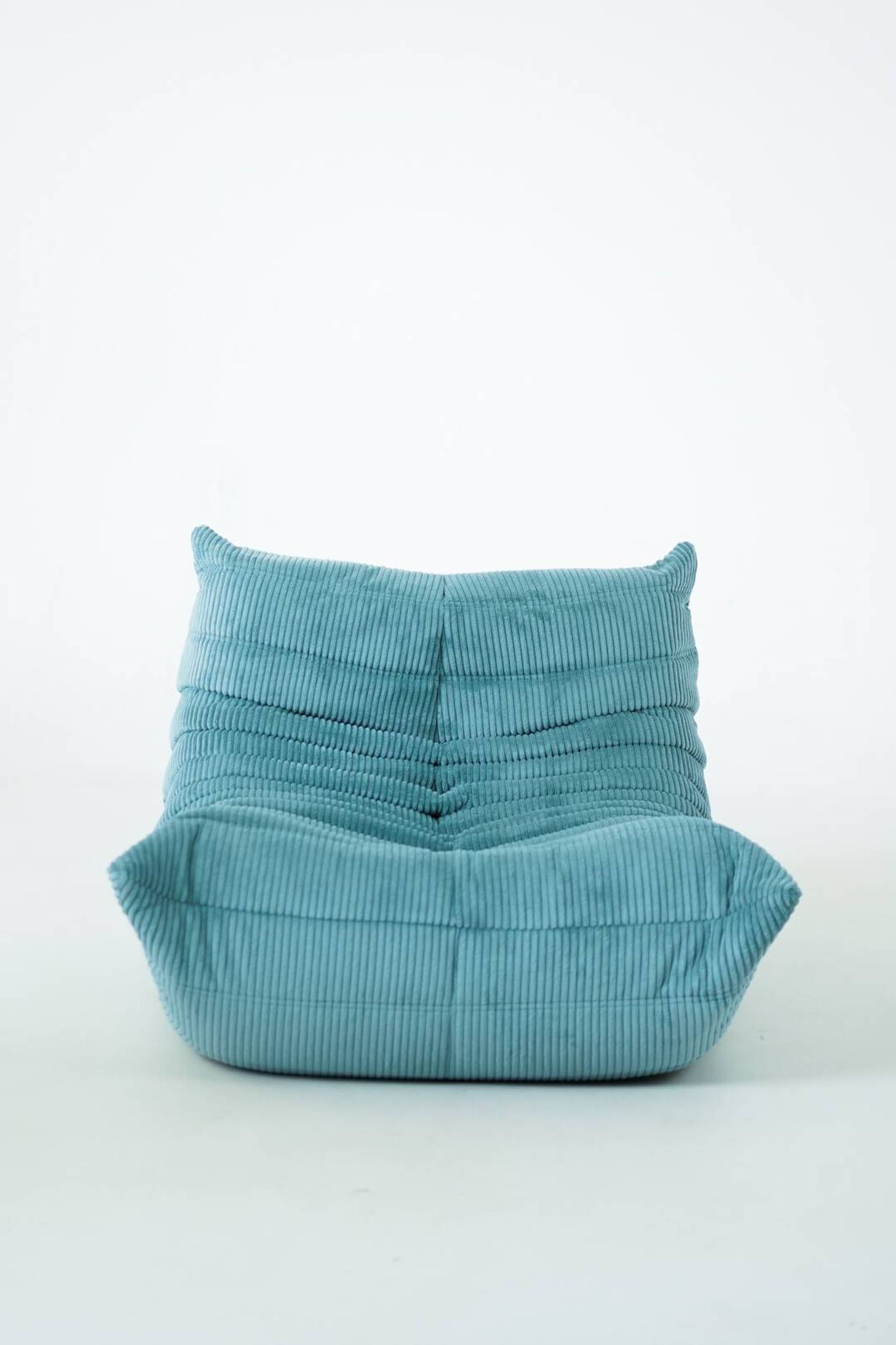 Togo set of armchair and pouf in light blue corduroy