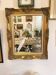 Golden wooden mirror in Louis XV style