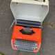 Grey and orange rapido typewriter