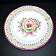 Saint-Clément earthenware rooster plate with floral medallion and ribbon decoration