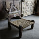 Chaise en bois sculpté et corde