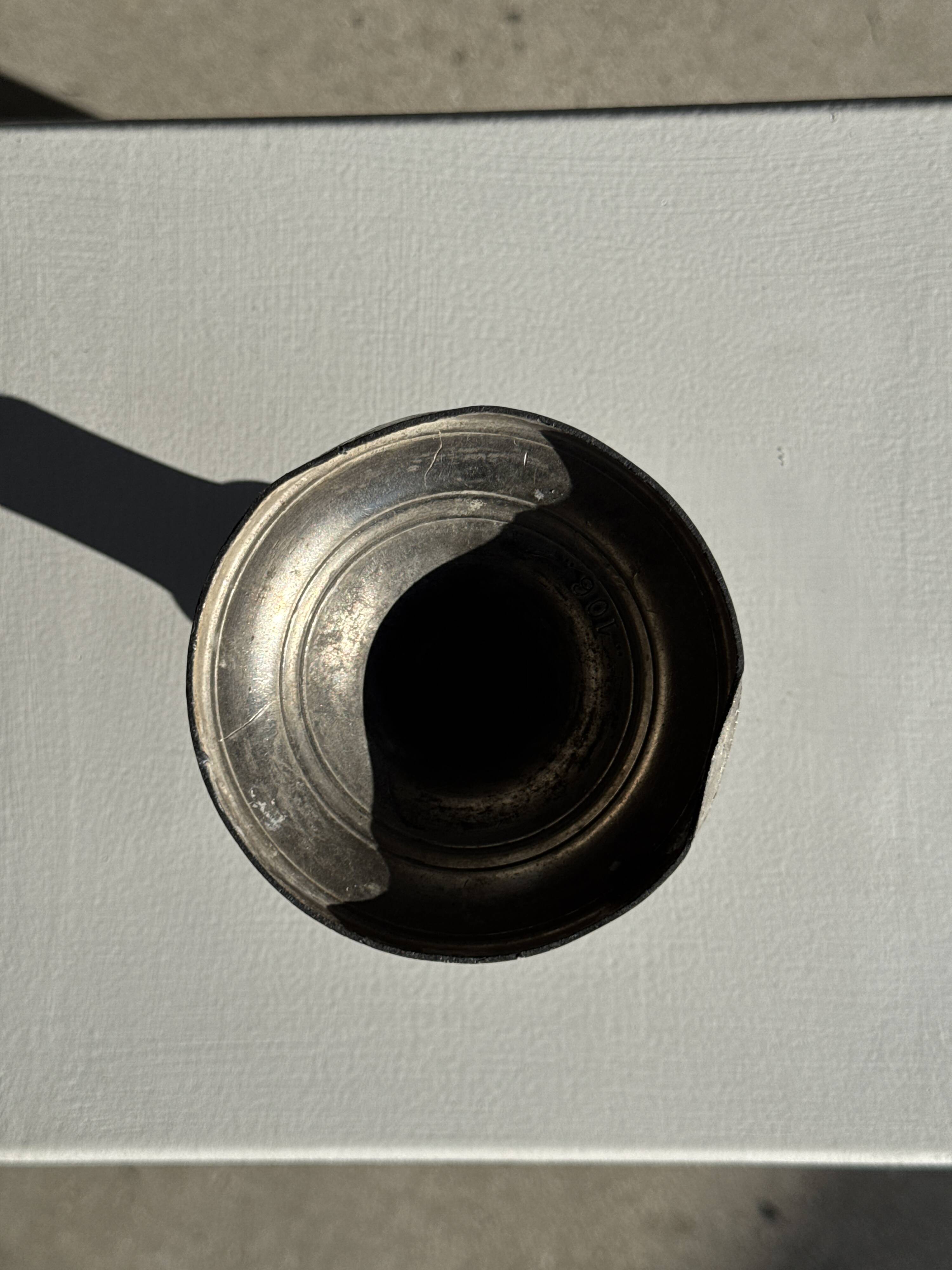 Small antique candle holder engraved in silver-plated metal, in its original condition.