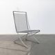 Vintage German Kreuzschwinger lounge chair by Till Behrens for Meyer Stahlmöbel, 1980s.