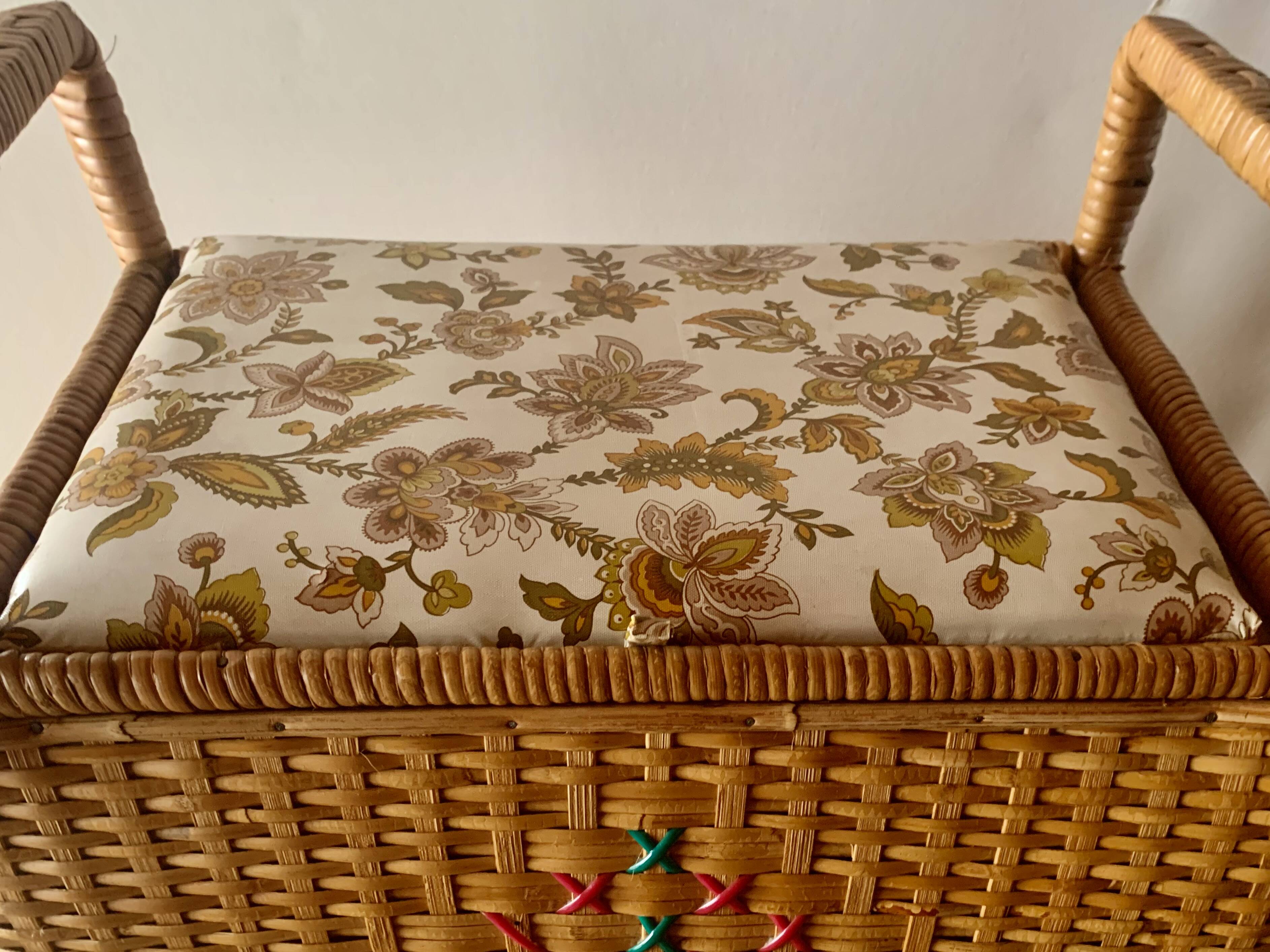 Large vintage rattan and wicker sewing basket with floral decor seat