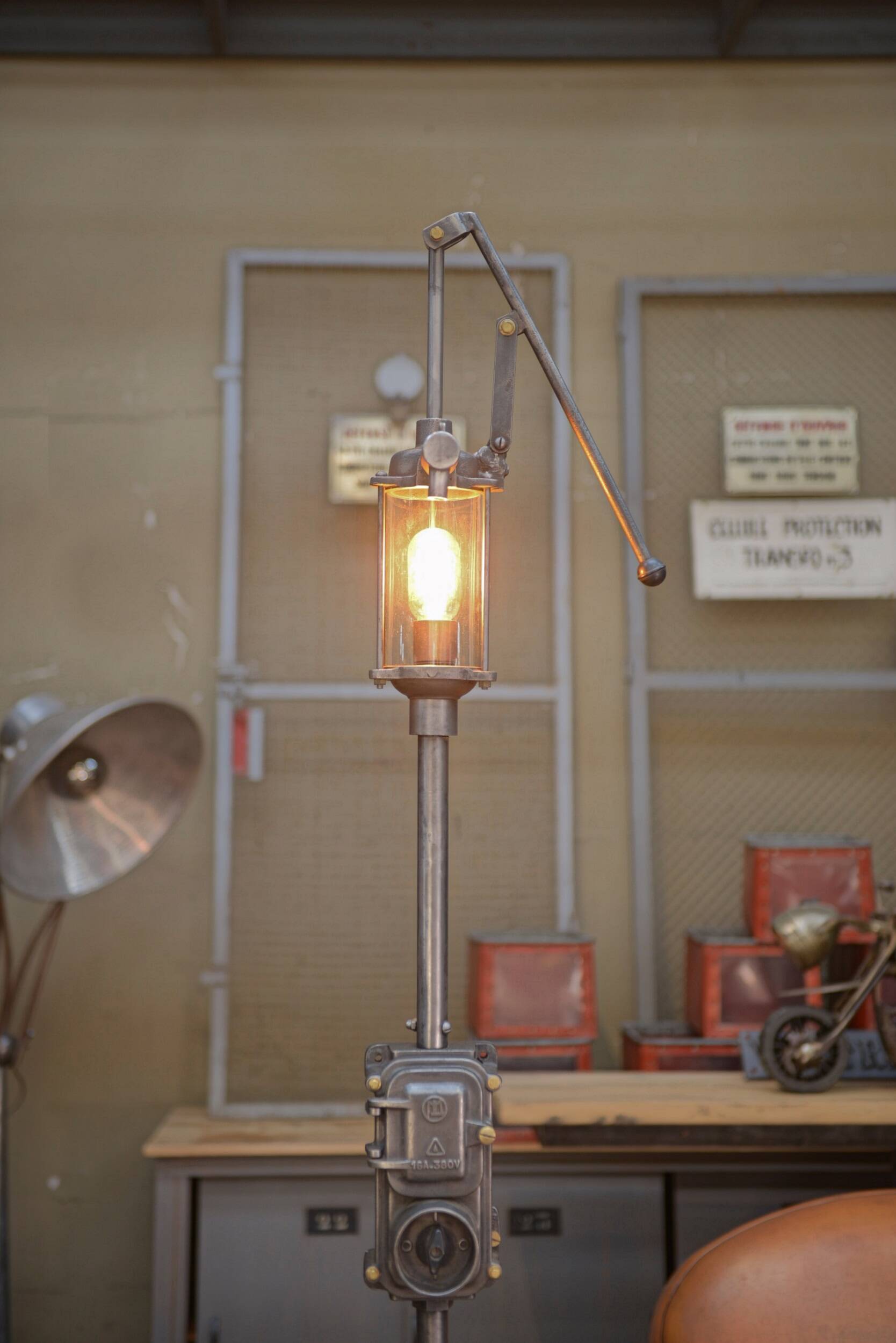 Old gas pump floor lamp in cast iron metal and glass 1930