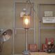 Old gas pump floor lamp in cast iron metal and glass 1930
