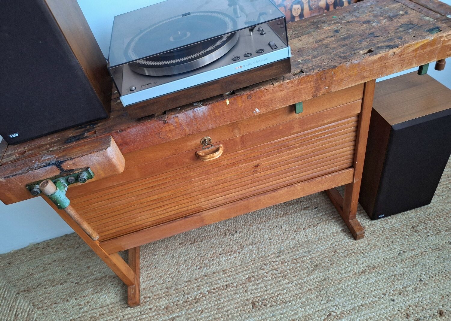 Vintage workbench with vices, antique workshop furniture.