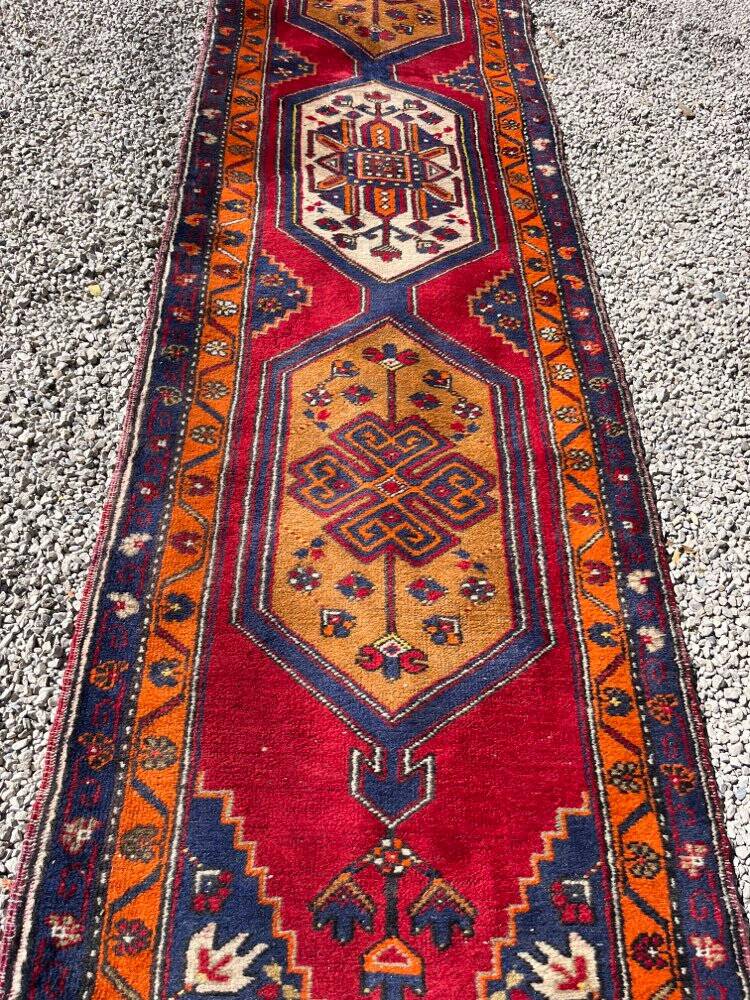 Long antique Persian carpet