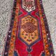 Long antique Persian carpet