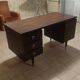 Bureau à caissons vers 1970 en palissandre de Rio 4 faces