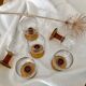 6 Amber stemmed glasses an'70