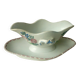 Sauceboat in faience decorated with a rooster, Sarreguemines, Nord of France.