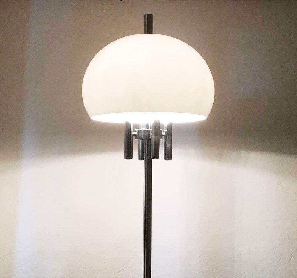Italian space-style floor lamp from the 1960s with a stone base.