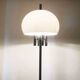 Italian space-style floor lamp from the 1960s with a stone base.