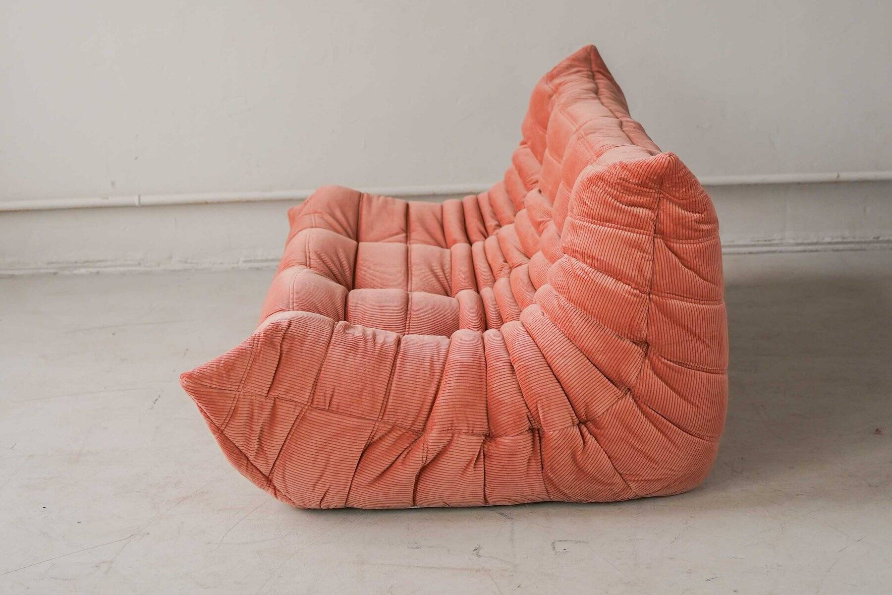 Coral corduroy Togo three-seat sofa by Michel Ducaroy for Ligne Roset